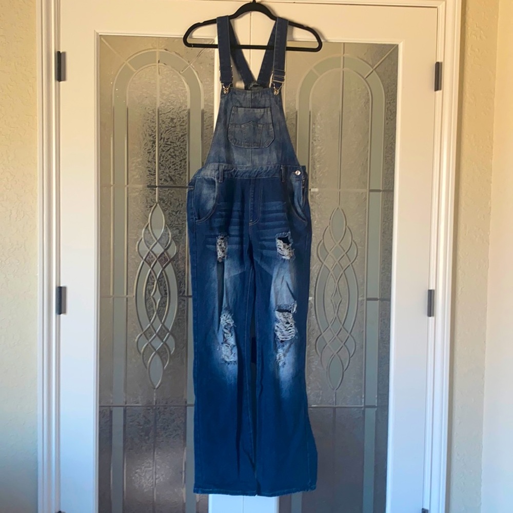 Distressed jean overalls